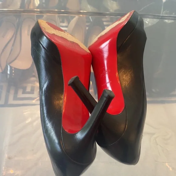Christian Louboutin black leather pumps. Size 9… Good condition